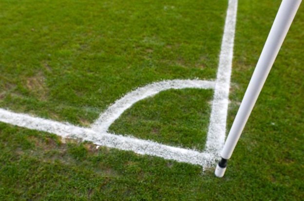 Corner flag and quadrant of a soccer pitch