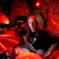 Danny Carey of Tool sitting at a drum kit