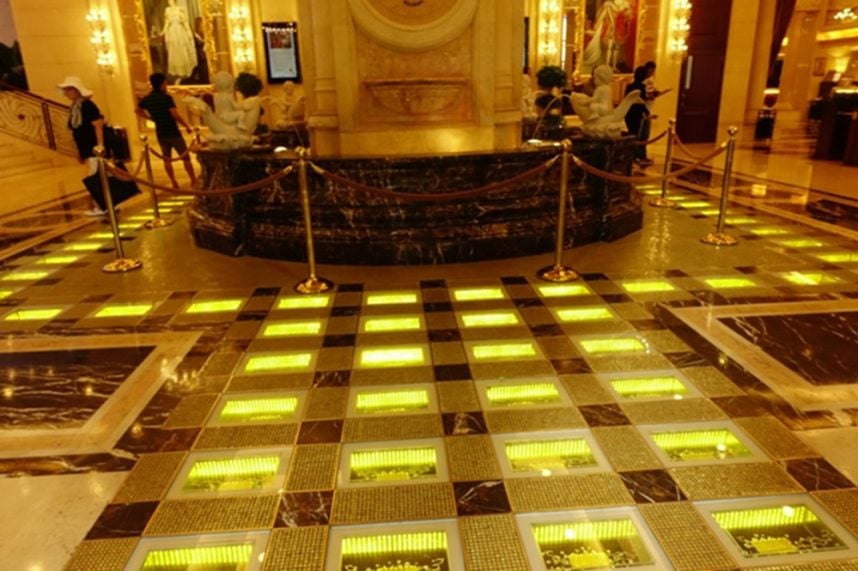 Macau casinos, Grand Emperor Hotel, satellite casinos, gold prices, casino closures, gold walkway