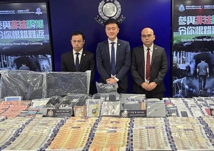Hong Kong gambling, World Cup betting, illegal bookmaker, Hong Kong police, sports betting crackdown, triad syndicate, HKJC, offshore betting websites
