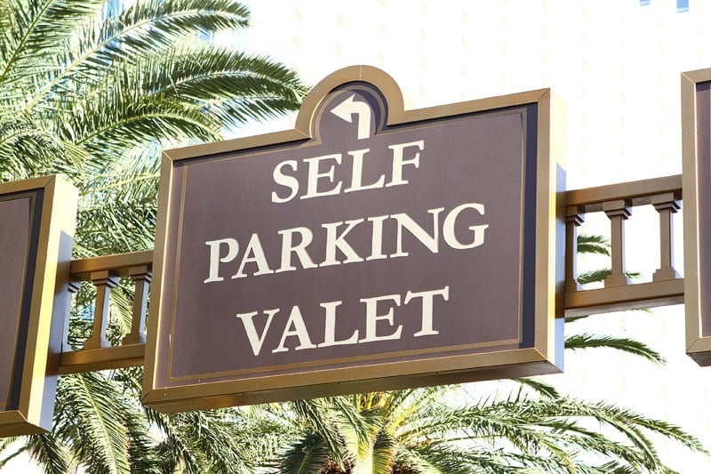 self parking valet sign