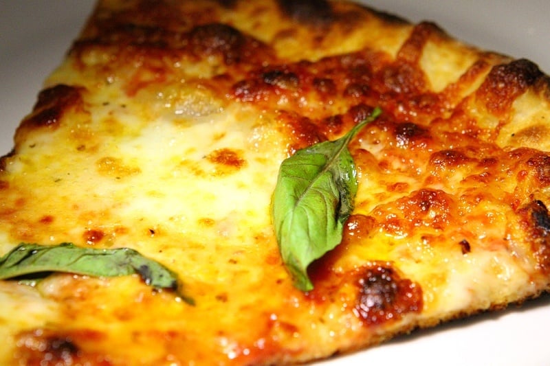 The pizza is cooked at 550 degrees, which we like not only for the taste, but also because it tends to arrive more quickly that way.
