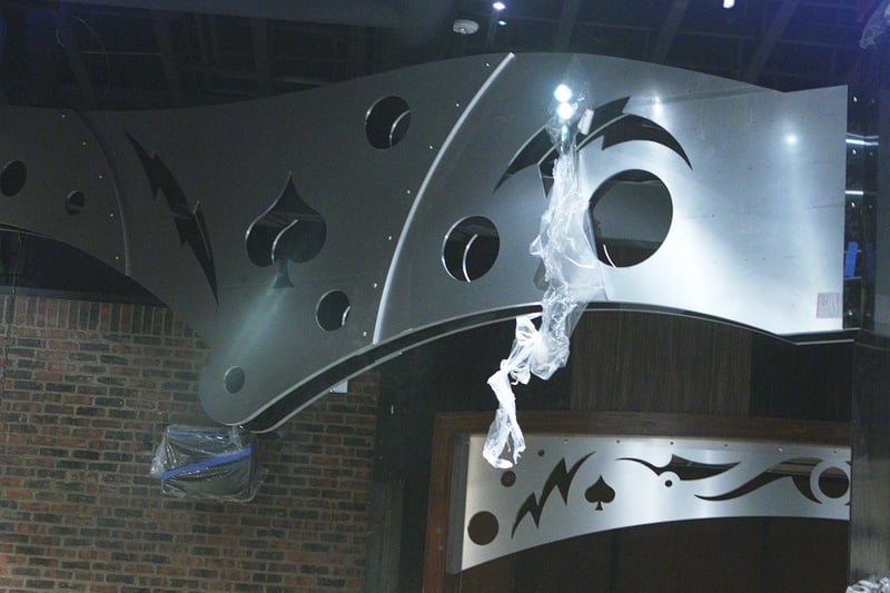 We're big fans of these decorative flourishes on the ceiling. Funky, with playing card symbols.