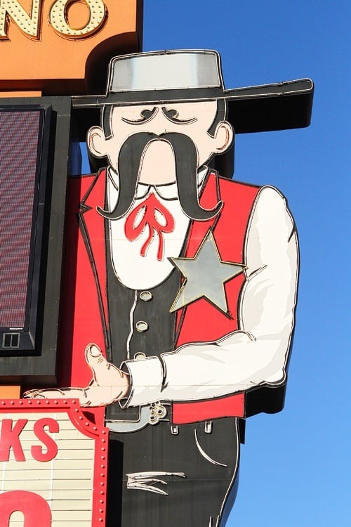 This town ain't big enough for a cowpoke this squinty.