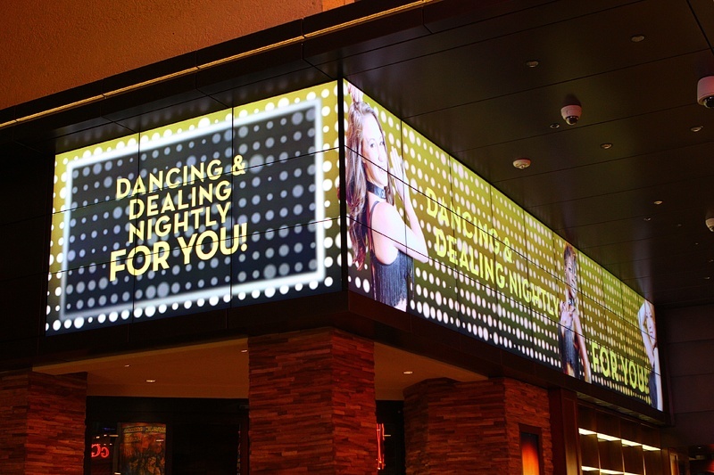 What were the odds these screens would include go-go dancers? Answer: Downtown knows what it's doing.