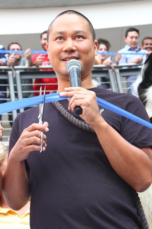 Zappos CEO Tony Hsieh takes part in the ribbon-cutting.