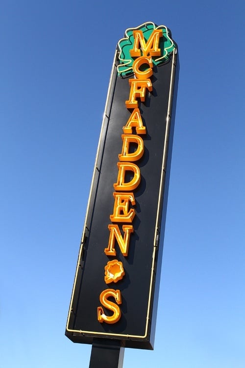 Before it drank, this sign was straight up and down.
