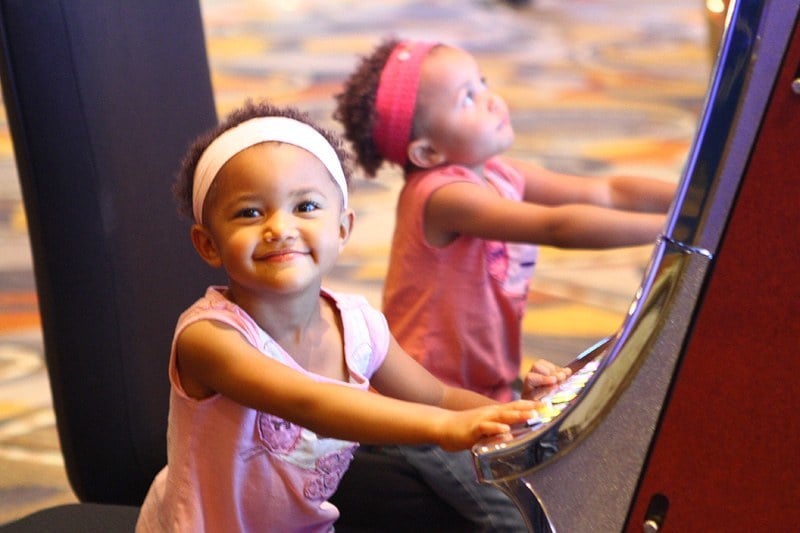 kids playing slot machines